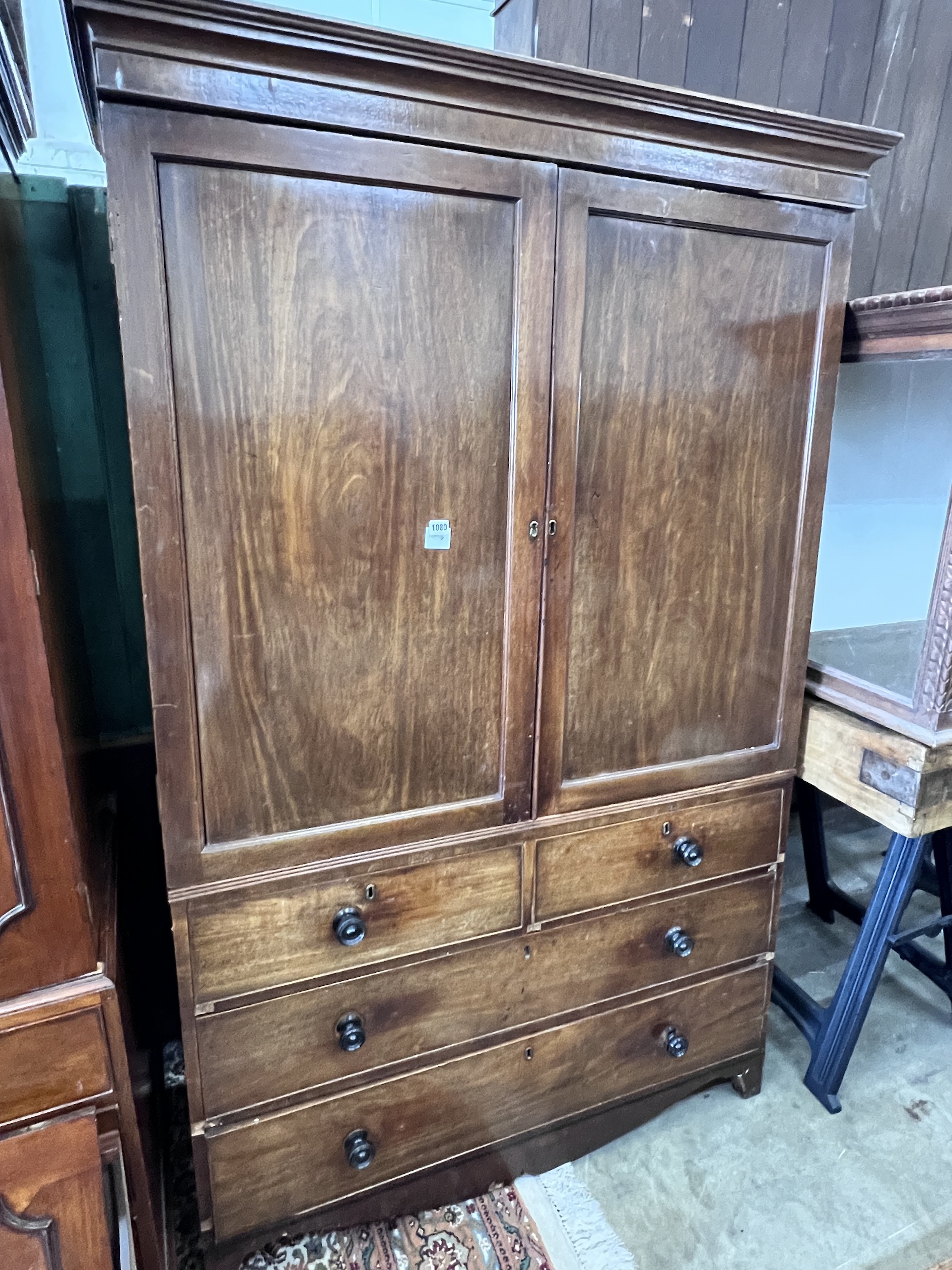 A George III mahogany linen press, width 130cm, depth 60cm, height 200cm